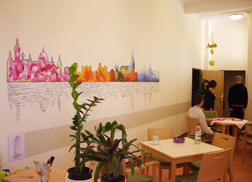 Wandmalaktion mit Jugendlichen: Skyline Schwerins im Frühling, Sommer, Herbst und Winter Wandmalaktion mit Jugendlichen: Skyline Schwerins im Frühling, Sommer, Herbst und Winter