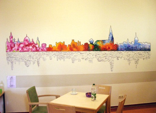 Wandmalaktion mit Jugendlichen: Skyline Schwerins im Frühling, Sommer, Herbst und Winter Wandmalaktion mit Jugendlichen: Skyline Schwerins im Frühling, Sommer, Herbst und Winter